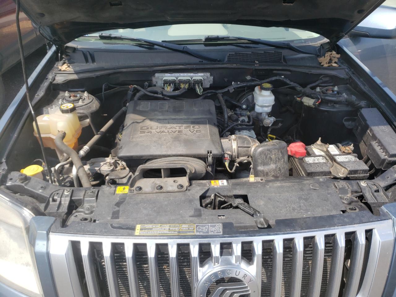 Photo 7 from auction – 2011 MERCURY 1114 with VIN 4M2CN9HG4BKJ04321