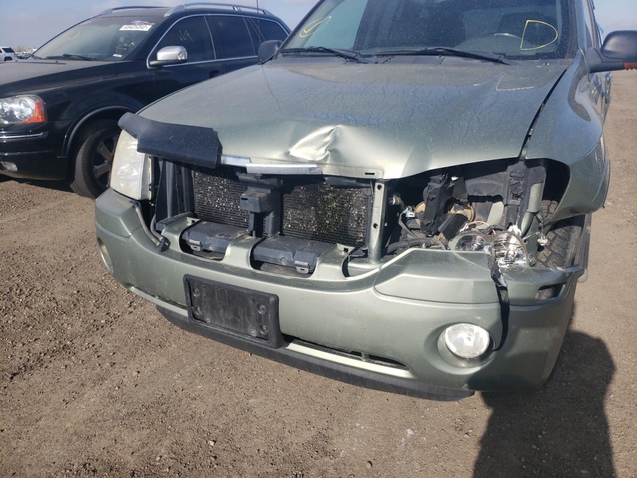 Photo 9 from auction – 2003 GMC ENVOY with VIN 1GKDT13S732331327