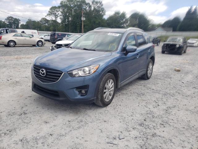 Photo 2 from auction – 2016 MAZDA CX-5 TOURI with VIN JM3KE2CY8G0865131