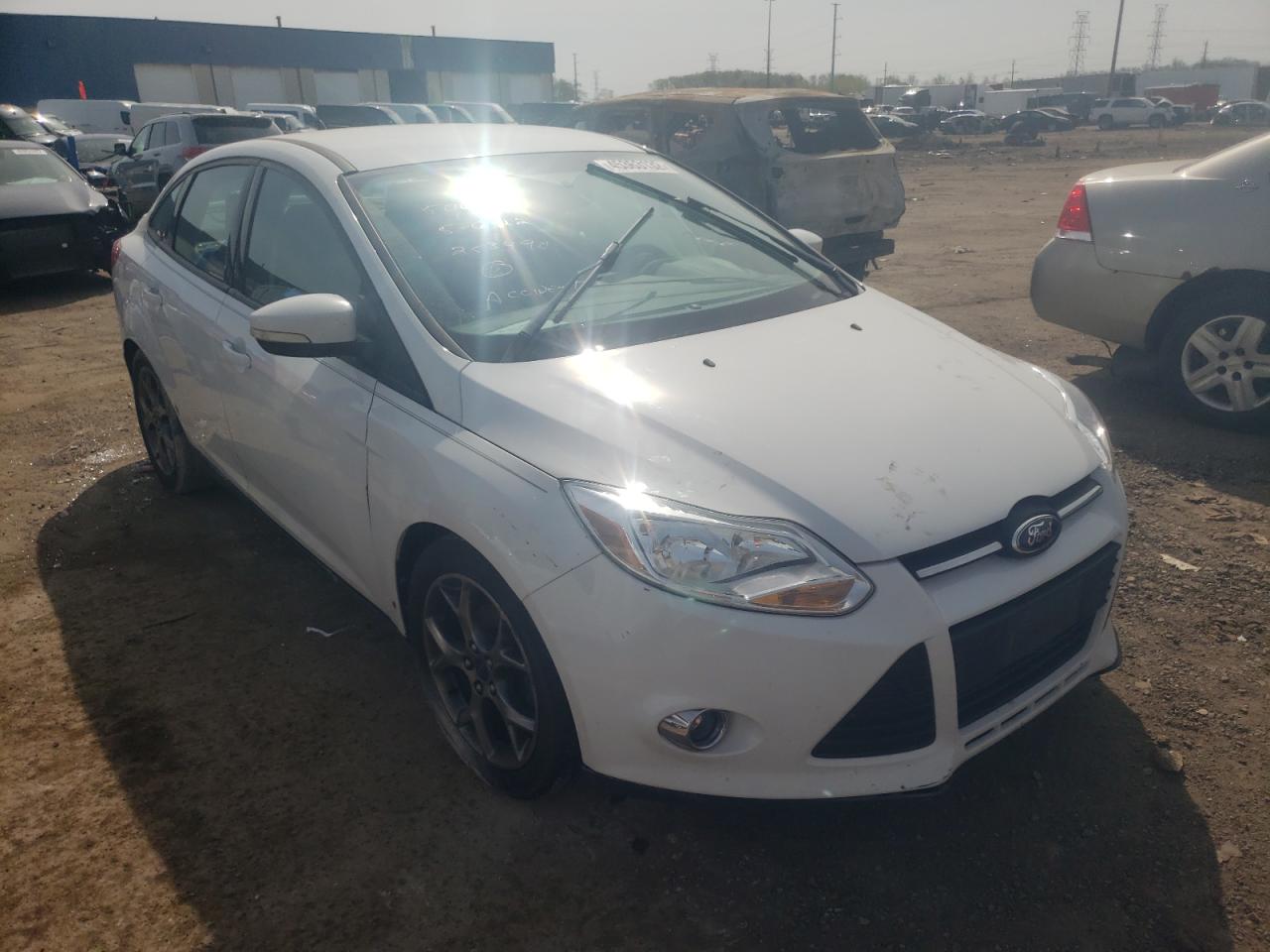 FORD FOCUS SE 2014 with VIN 1FADP3F28EL253490 - Photo from auction