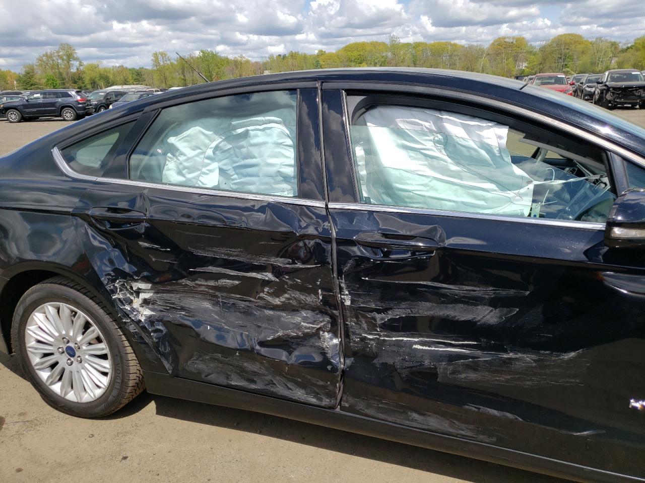 Photo 9 from auction – 2016 FORD FUSION SE with VIN 3FA6P0LU5GR262391