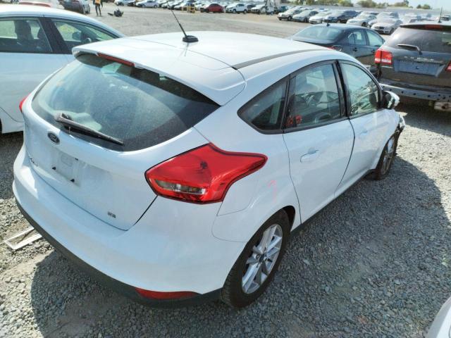 Photo 4 from auction – 2016 FORD FOCUS SE with VIN 1FADP3K2XGL364924