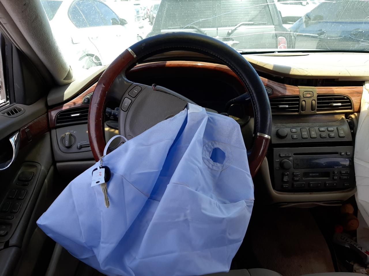 Photo 9 from auction – 2001 CADILLAC DEVILLE with VIN 1G6KD54Y31U183174