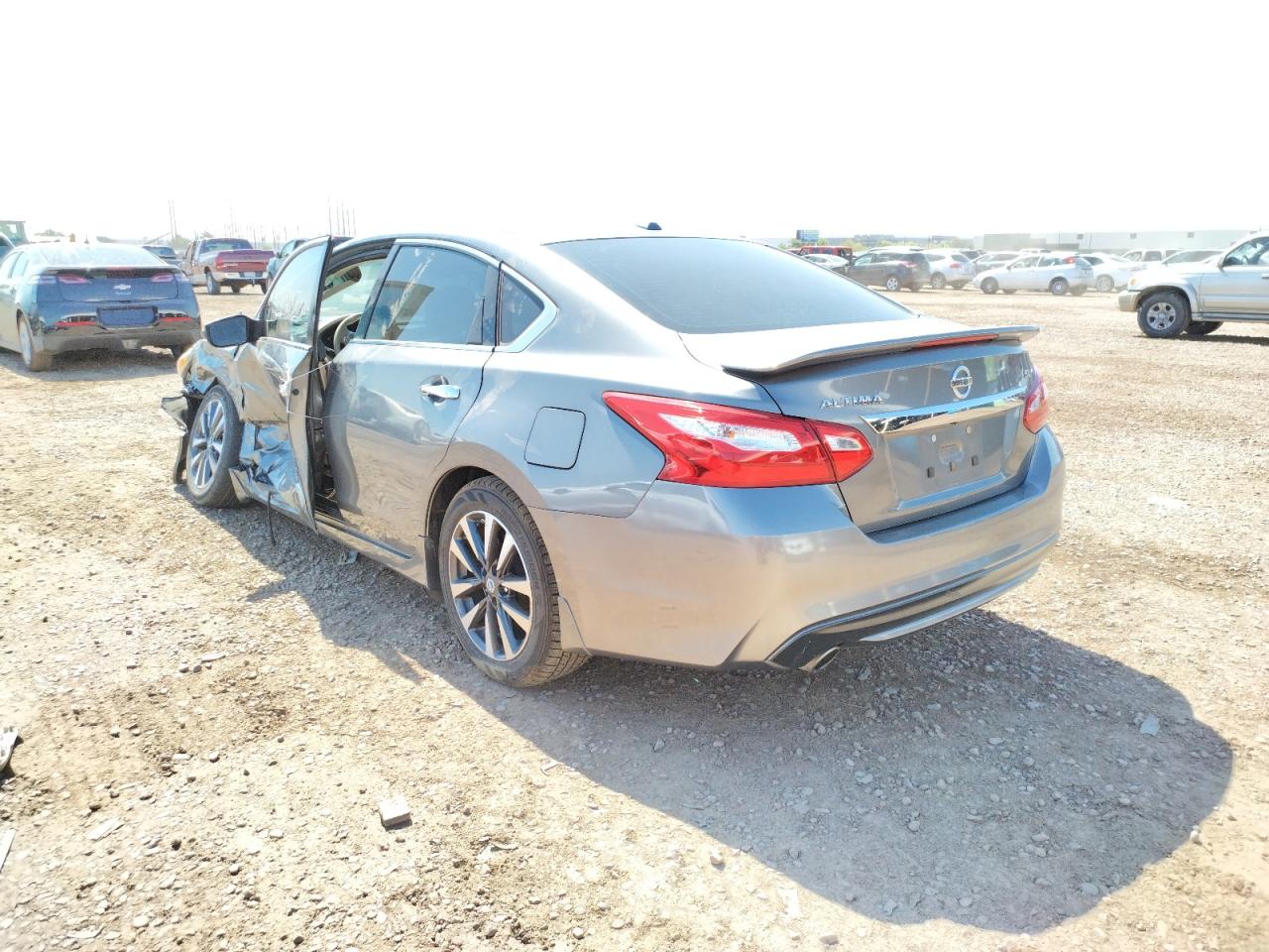 Photo 3 from auction – 2016 NISSAN ALTIMA 2.5 with VIN 1N4AL3AP1GC112037