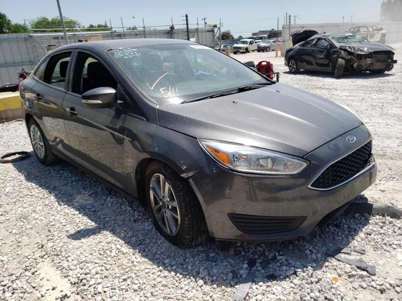FORD FOCUS SE 2016 with VIN 1FADP3F24GL346316 - Photo from auction