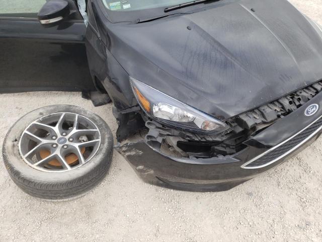 Photo 9 from auction – 2018 FORD FOCUS SEL with VIN 1FADP3M22JL311378