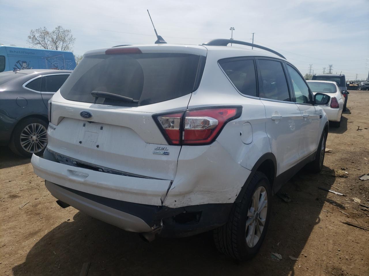 Photo 4 from auction – 2018 FORD ESCAPE SEL with VIN 1FMCU9HD0JUC40037