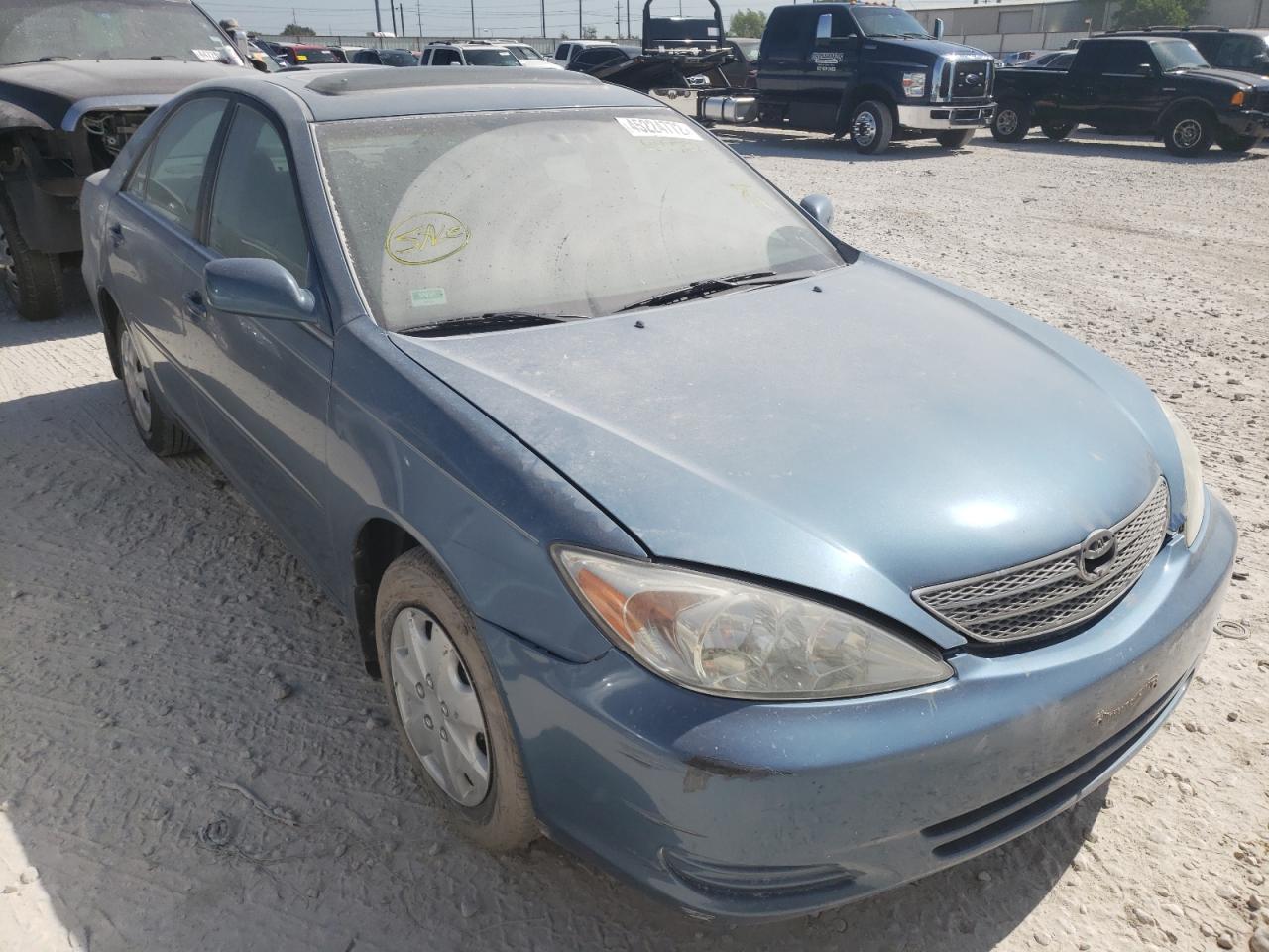 TOYOTA CAMRY LE 2002 with VIN 4T1BE30K72U557752 - Photo from auction