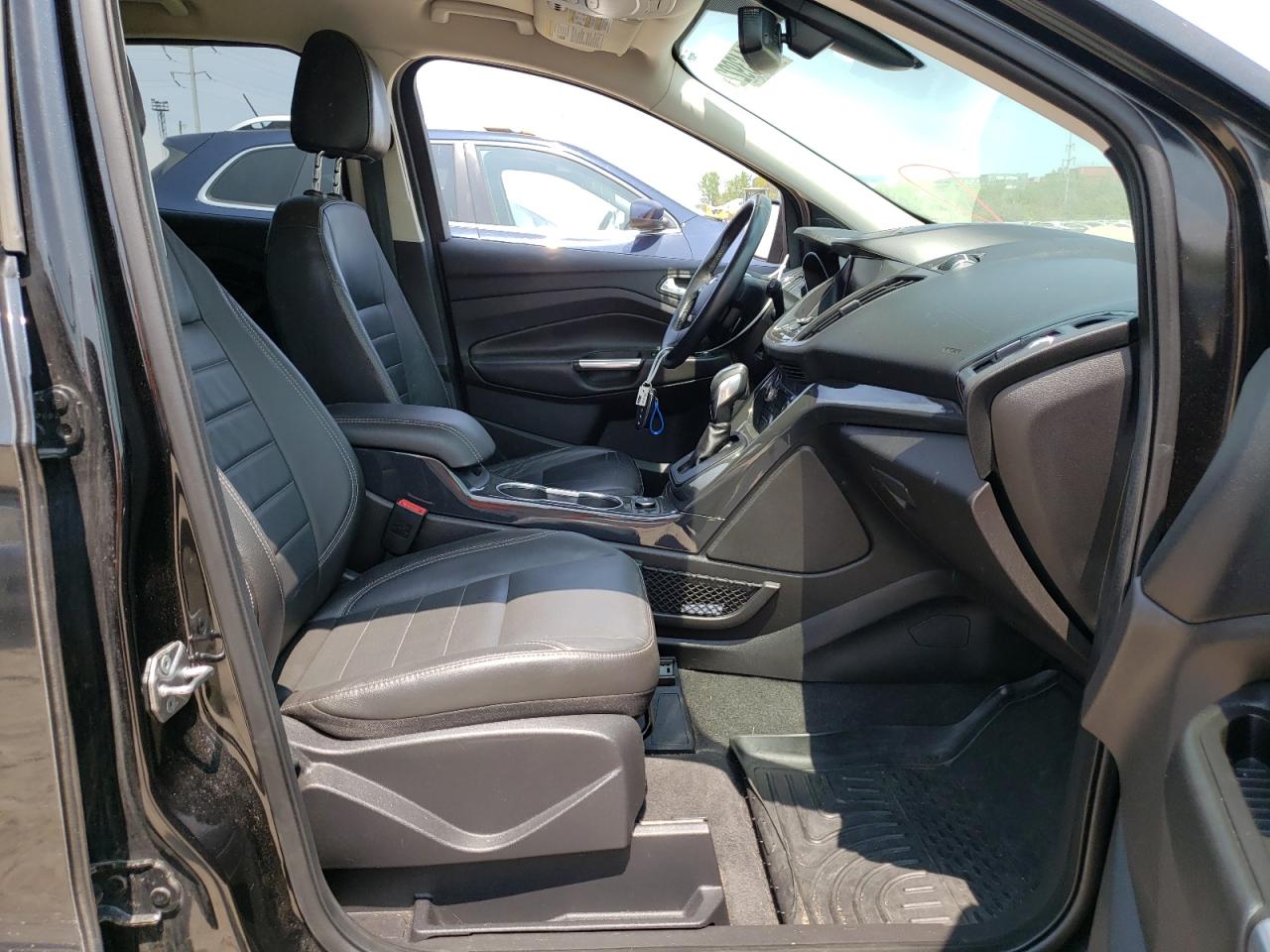 Photo 5 from auction – 2014 FORD ESCAPE TIT with VIN 1FMCU0J90EUE56073