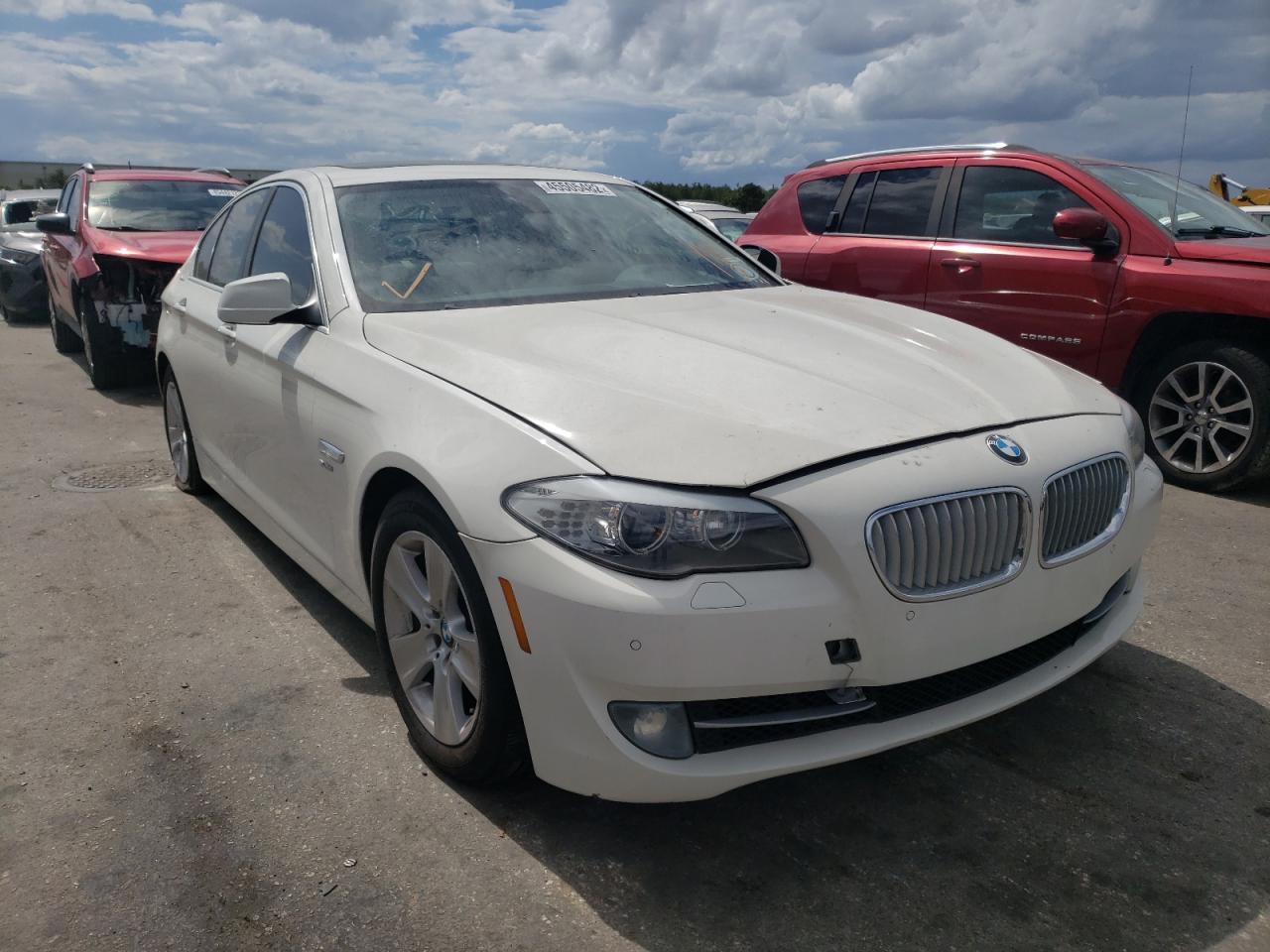 BMW 528 XI 2012 with VIN WBAXH5C51CDW09748 - Photo from auction