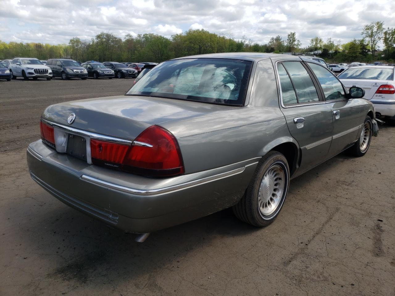 Photo 4 from auction – 2002 MERCURY GRAND MARQ with VIN 2MEFM75W42X645984