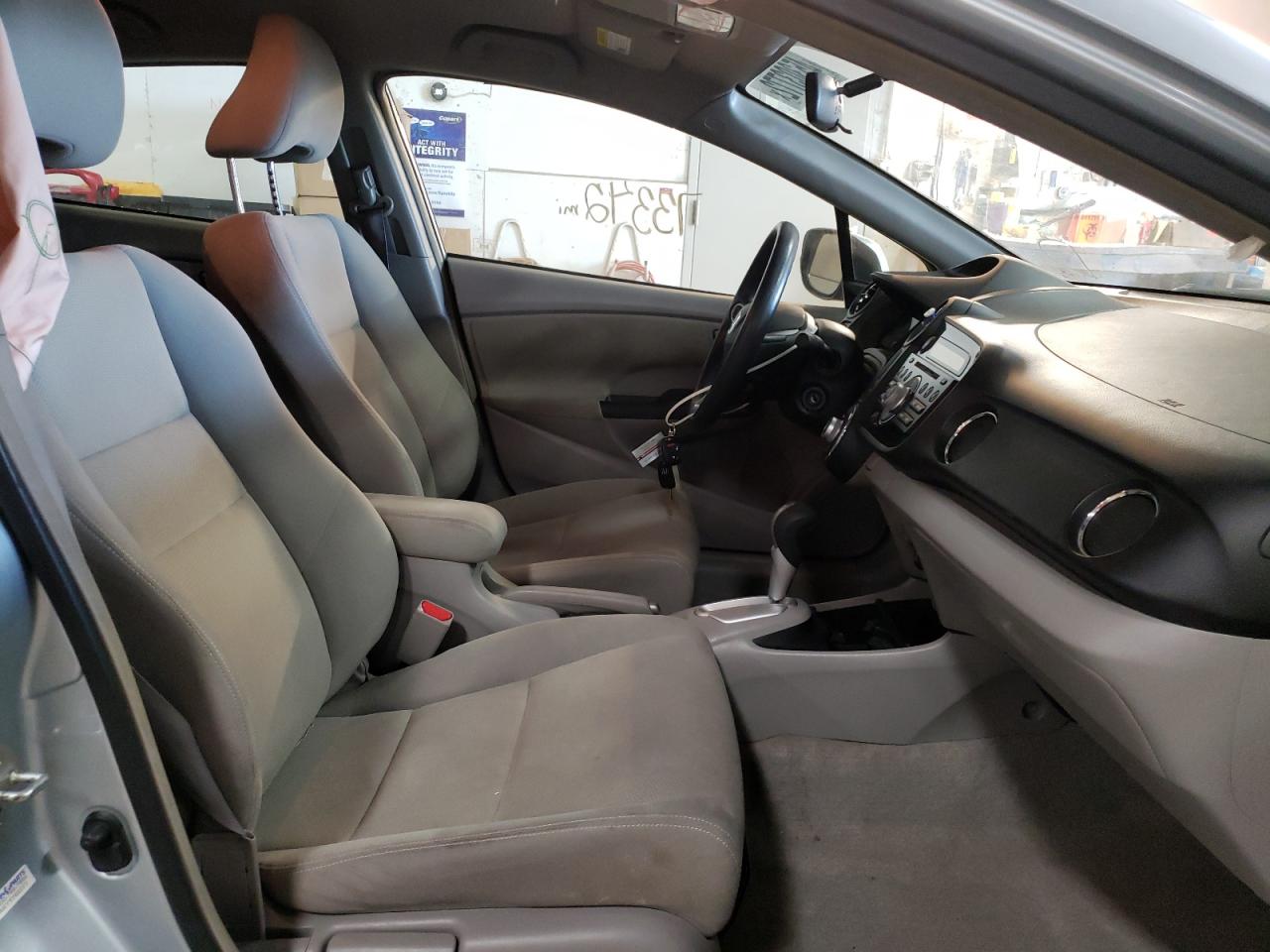 Photo 5 from auction – 2013 HONDA INSIGHT LX with VIN JHMZE2H52DS002779