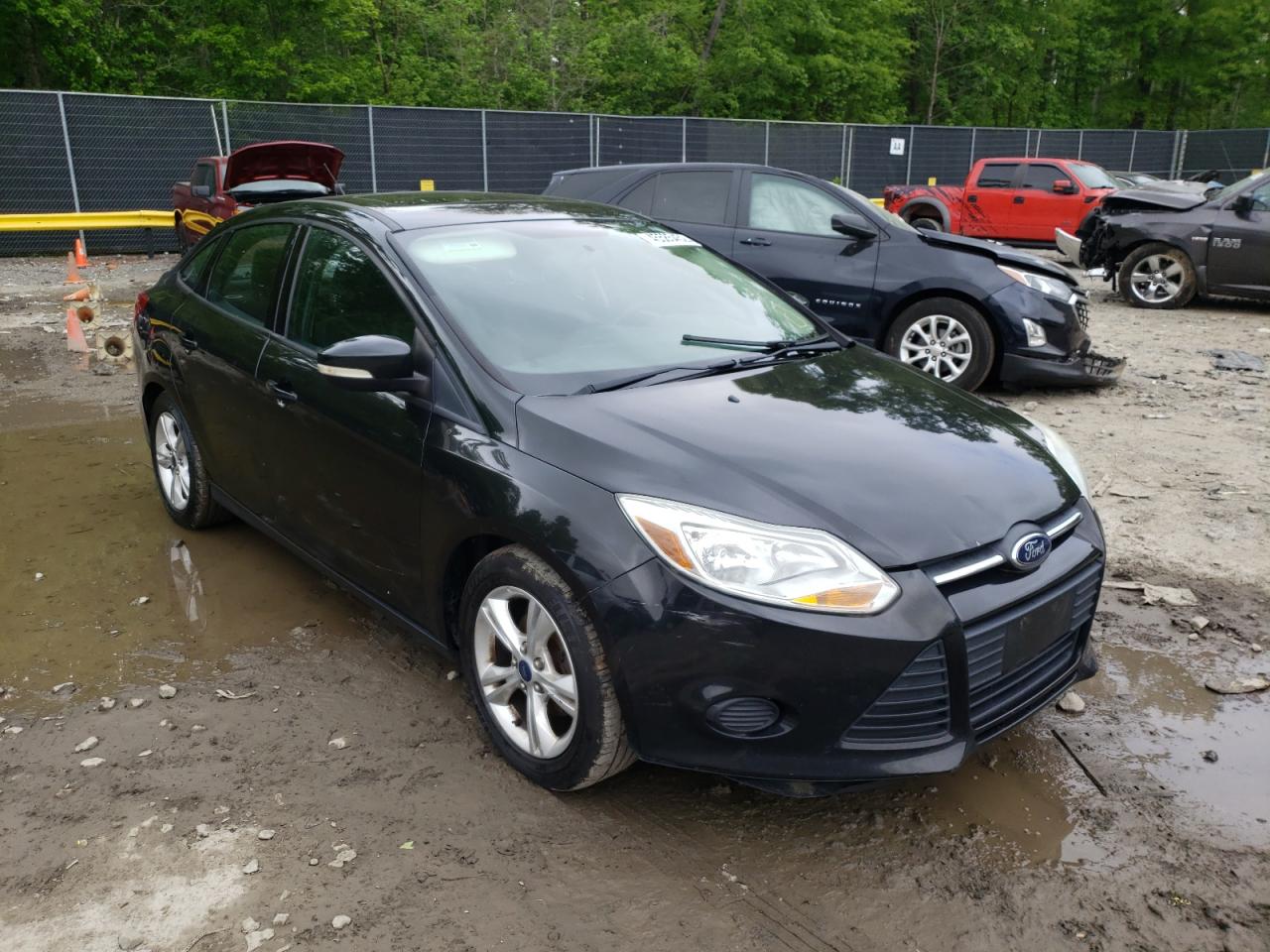 FORD FOCUS SE 2014 with VIN 1FADP3F27EL318054 - Photo from auction