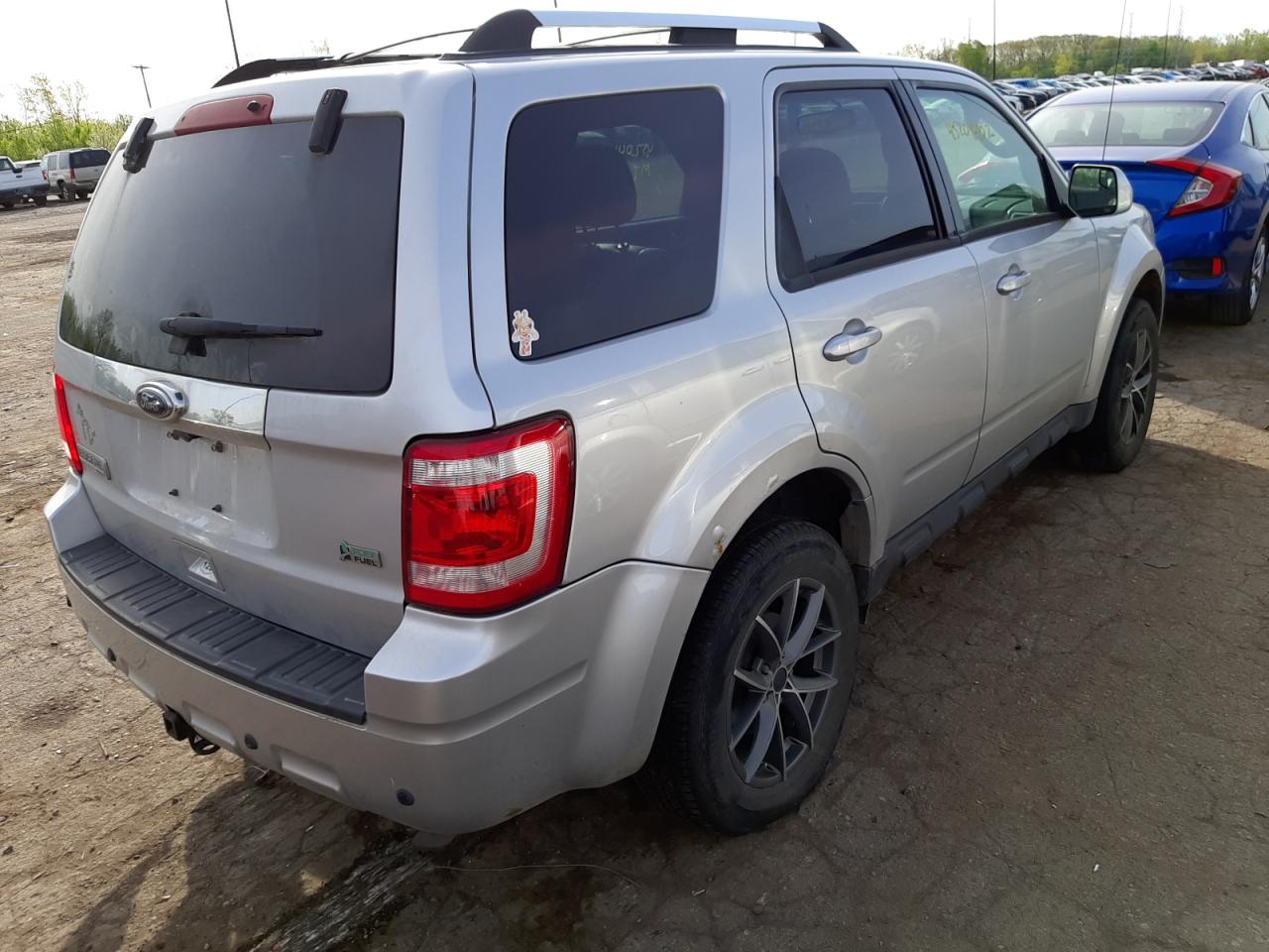 Photo 4 from auction – 2010 FORD ESCAPE LIM with VIN 1FMCU9EGXAKB80679