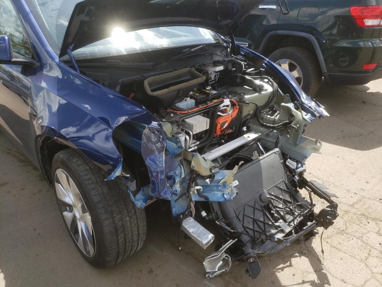 Photo 9 from auction – 2021 TESLA MODEL Y with VIN 5YJYGDEE2MF131156