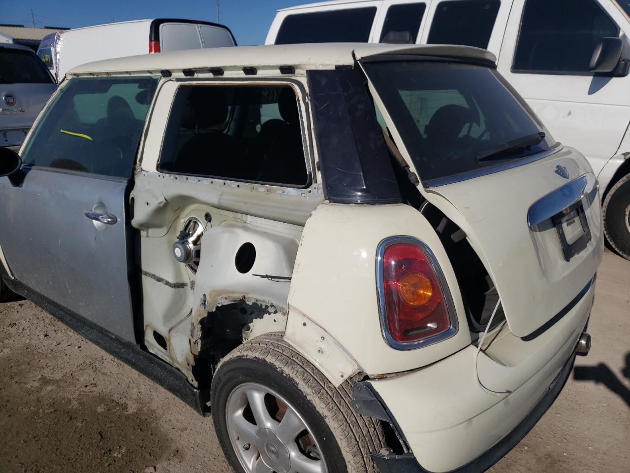 Photo 9 from auction – 2009 MINI COOPER with VIN WMWMF33559TW72864