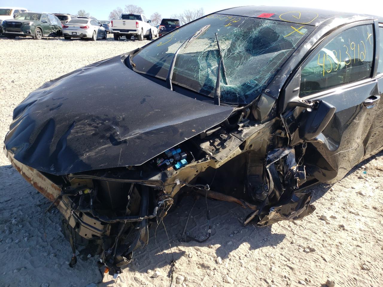 Photo 10 from auction – 2014 TOYOTA COROLLA L with VIN 5YFBURHEXEP138398