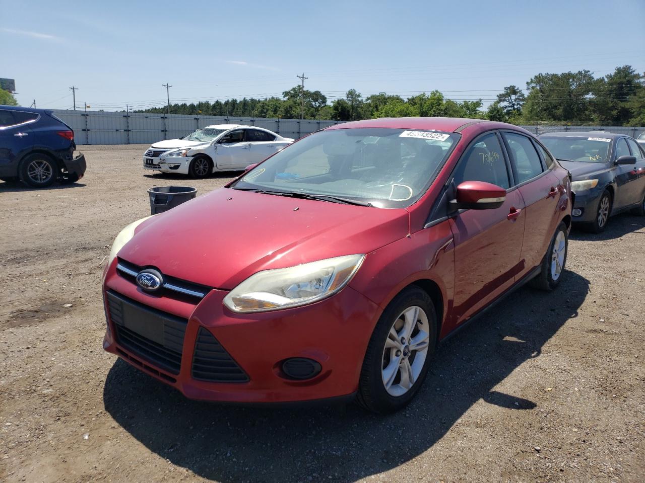 Photo 2 from auction – 2014 FORD FOCUS SE with VIN 1FADP3F23EL417258