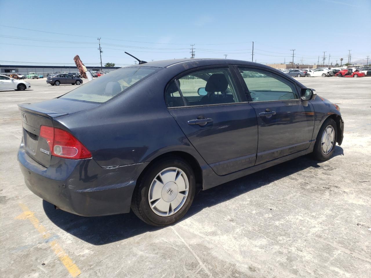 Photo 4 from auction – 2006 HONDA CIVIC HYBR with VIN JHMFA36206S019404
