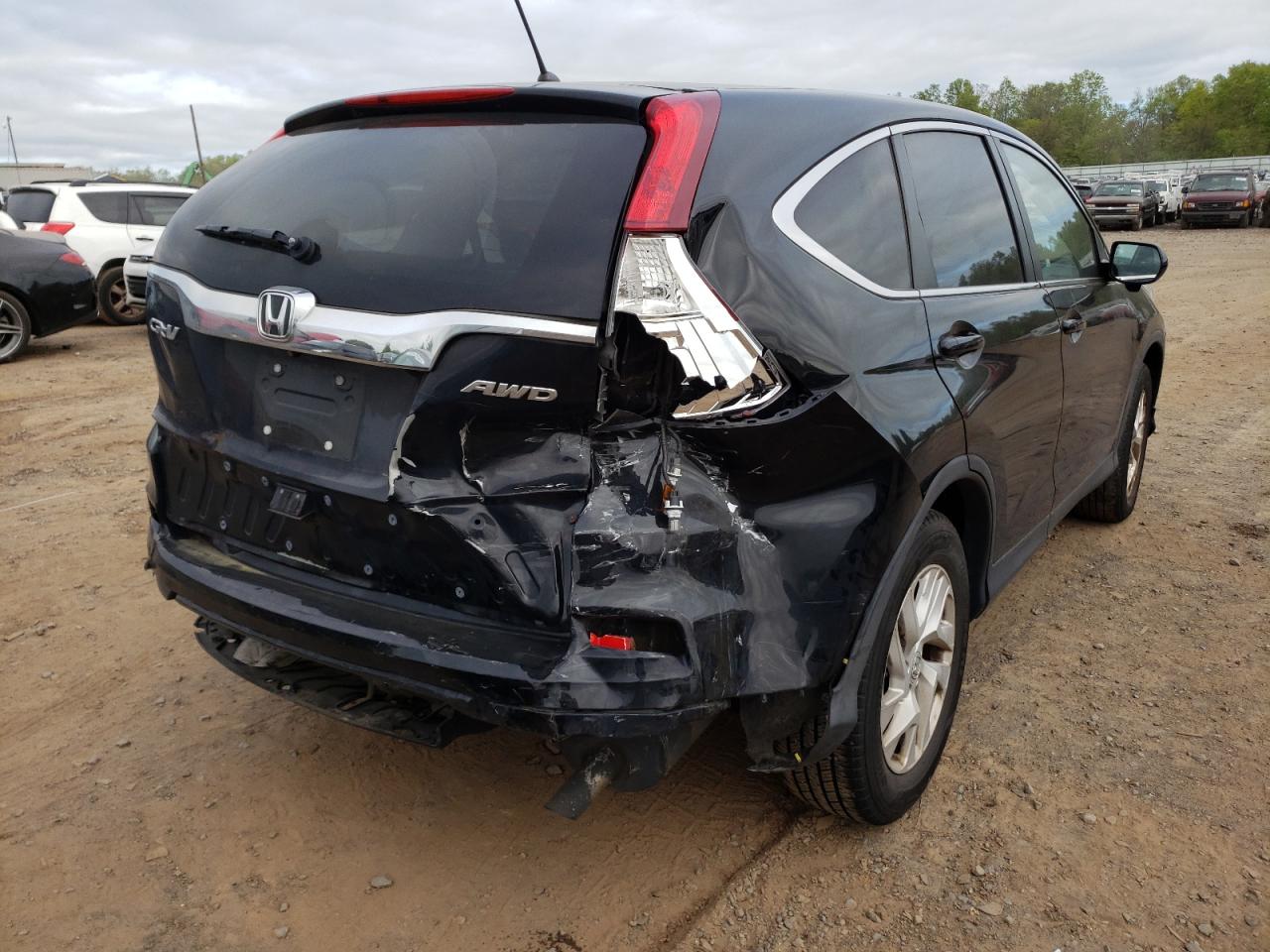 Photo 4 from auction – 2016 HONDA CR-V EX with VIN 2HKRM4H58GH630056
