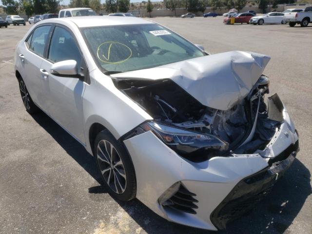 TOYOTA COROLLA L 2018 with VIN 5YFBURHEXJP808493 - Photo from auction