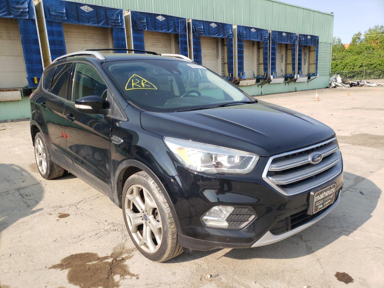 FORD ESCAPE TIT 2017 with VIN 1FMCU9J98HUA91523 - Photo from auction