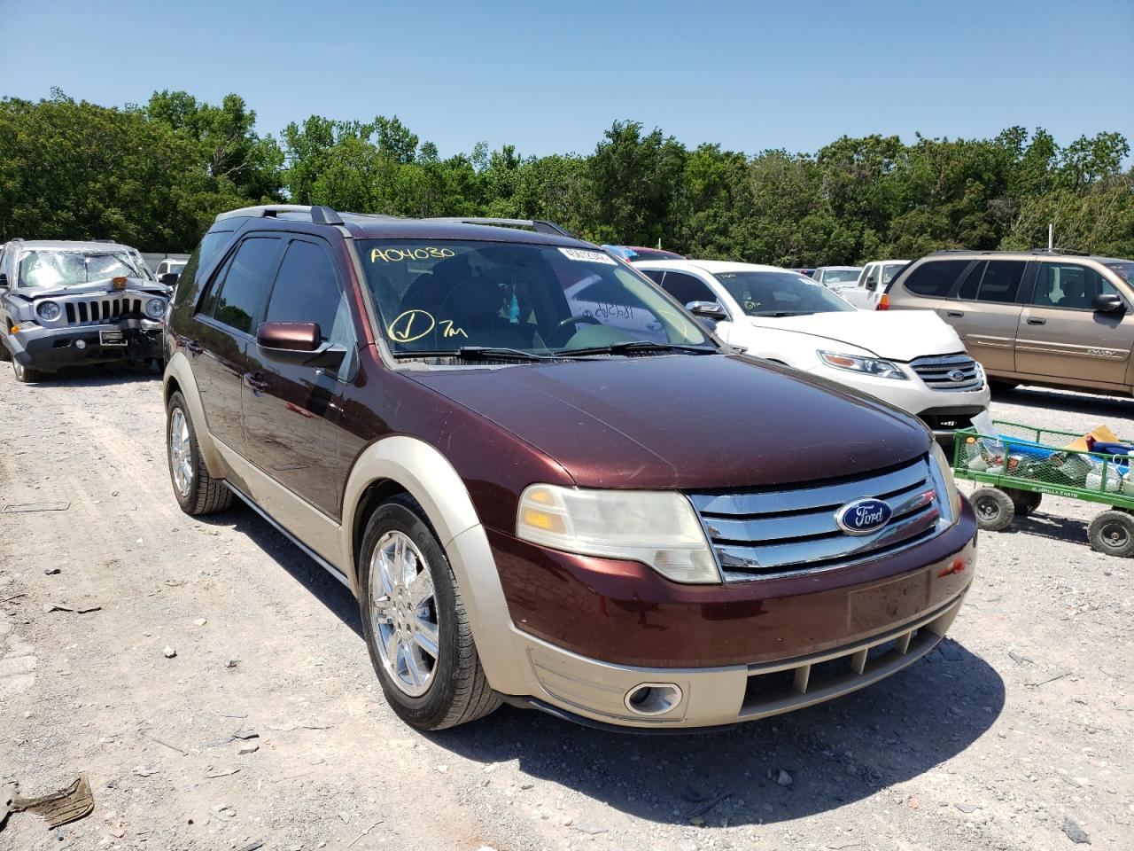 Photo 9 from auction – 2009 FORD TAURUS X E with VIN 1FMDK08WX9GA04030
