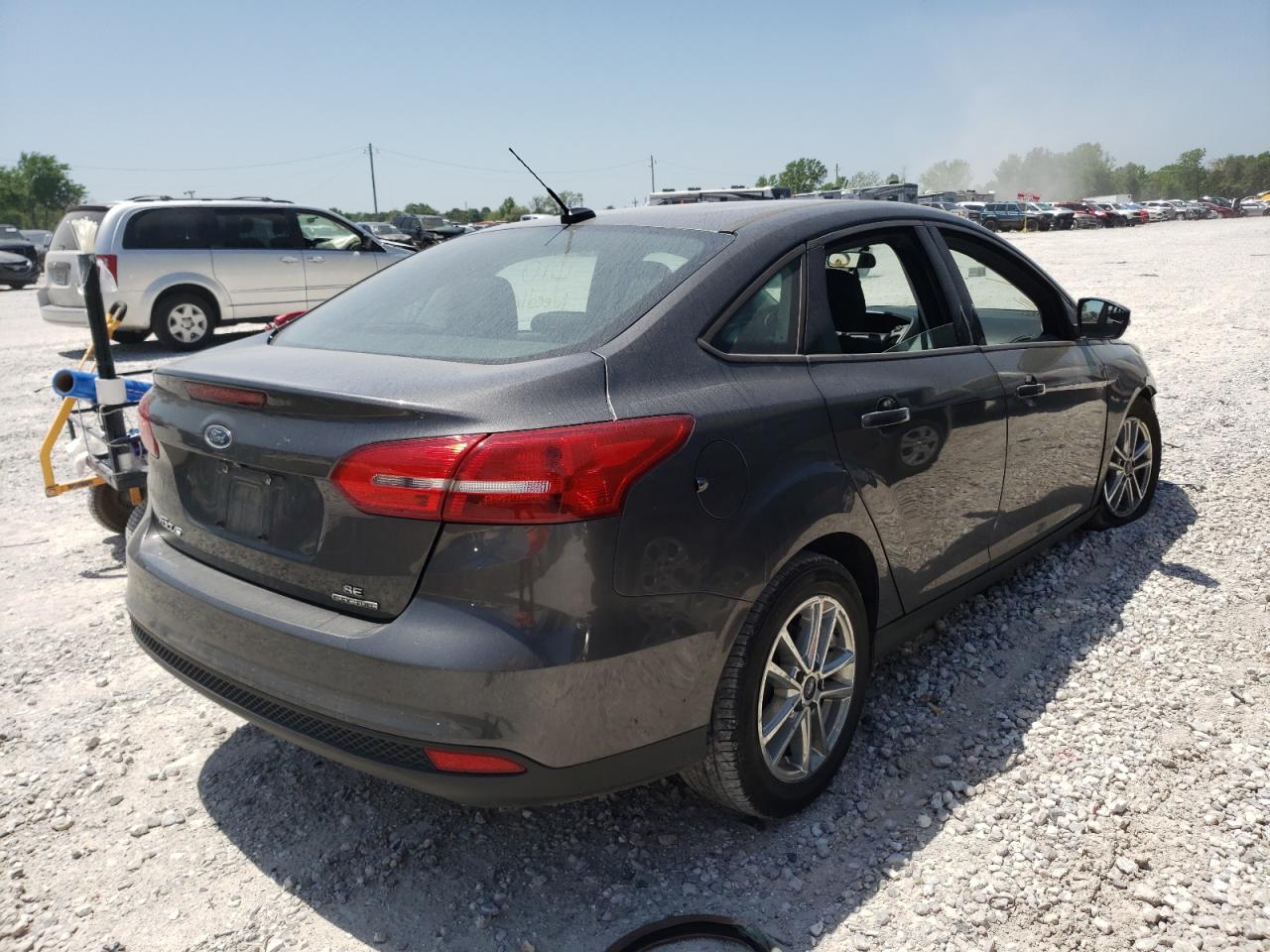 Photo 4 from auction – 2016 FORD FOCUS SE with VIN 1FADP3F24GL346316