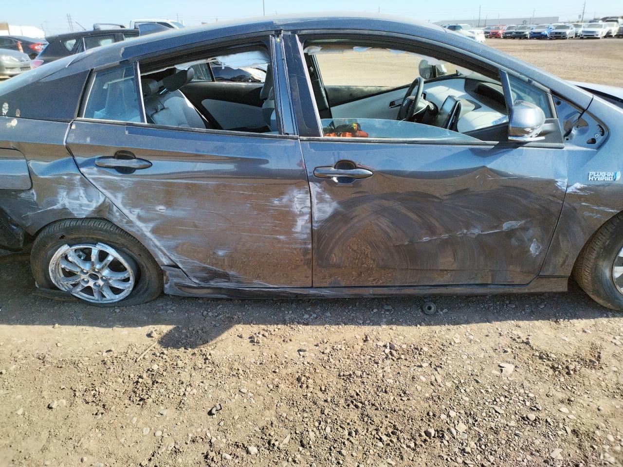 Photo 9 from auction – 2021 TOYOTA PRIUS PRIM with VIN JTDKAMFP2M3193628