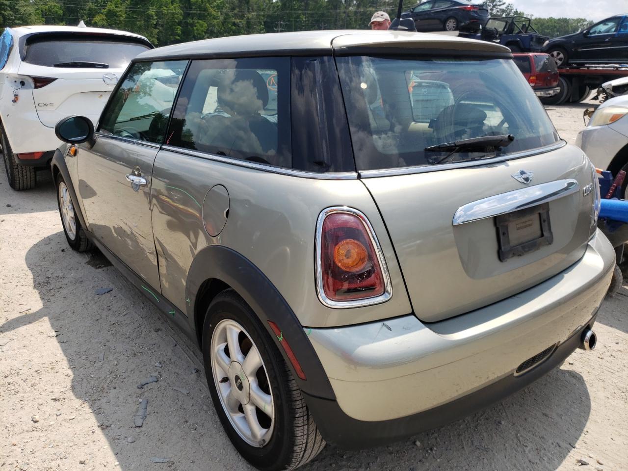 Photo 3 from auction – 2009 MINI COOPER with VIN WMWMF33599TT69070