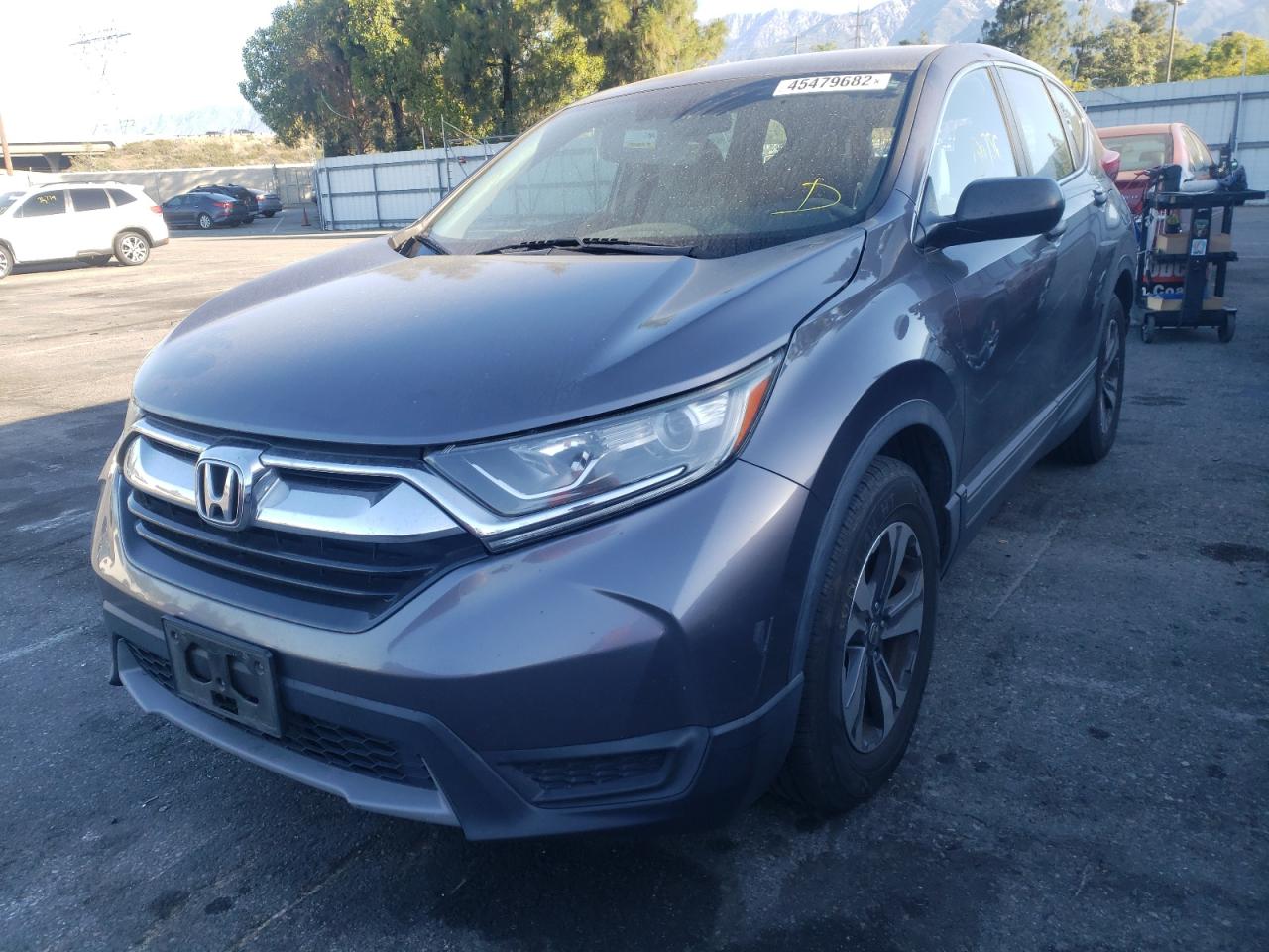 Photo 2 from auction – 2017 HONDA CR-V LX with VIN 7FARW5H30HE001913