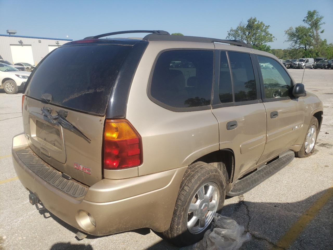 Photo 4 from auction – 2004 GMC ENVOY with VIN 1GKDS13S942215325