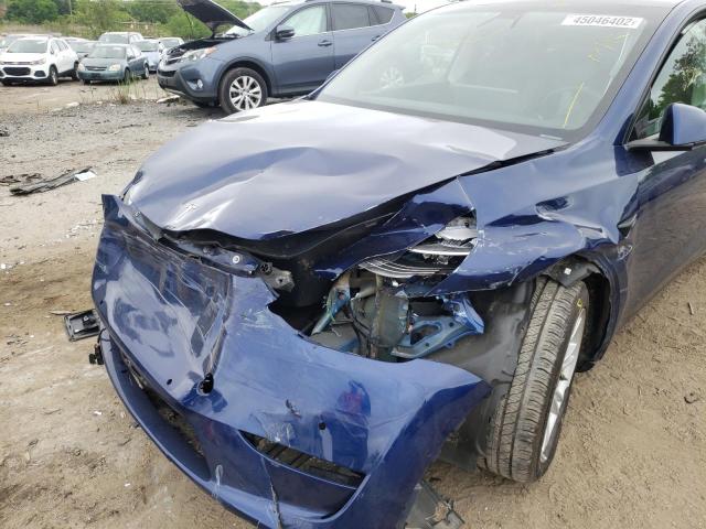 Photo 9 from auction – 2021 TESLA MODEL Y with VIN 5YJYGAEE4MF142562