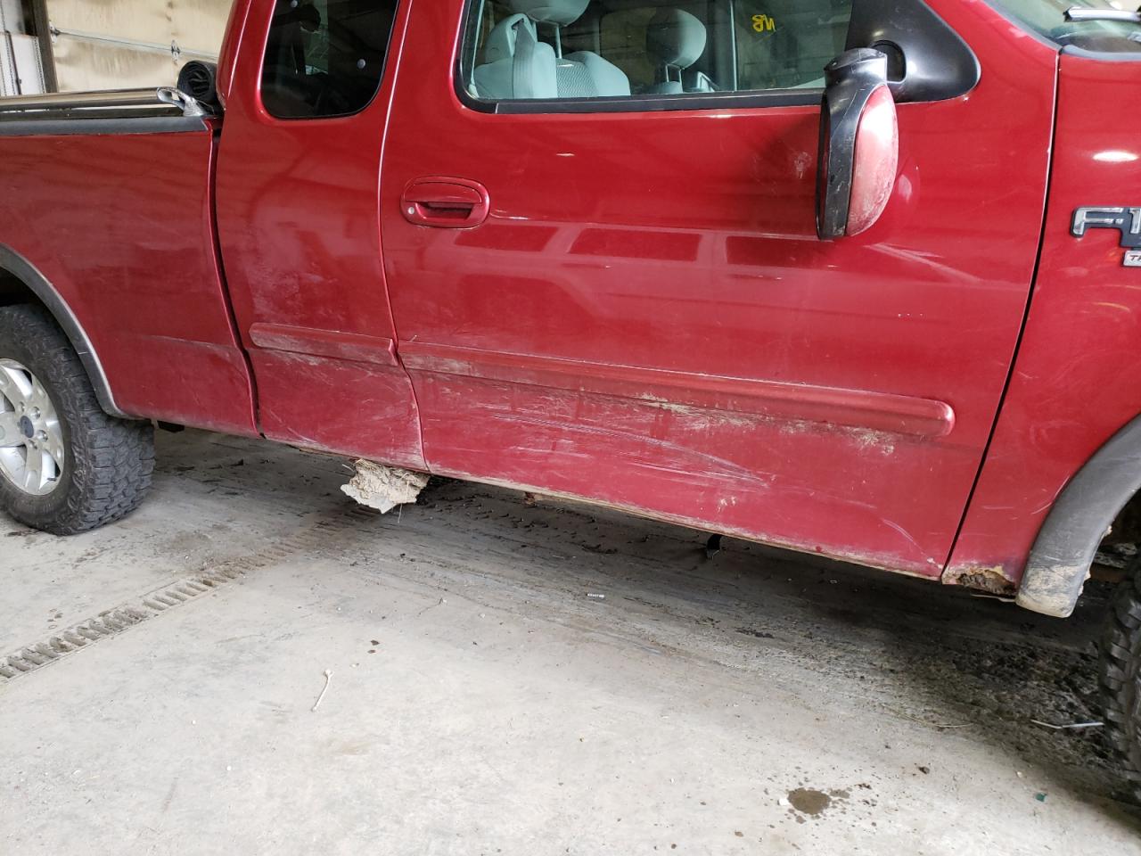 Photo 9 from auction – 2003 FORD F150 with VIN 2FTRX18L13CA66528