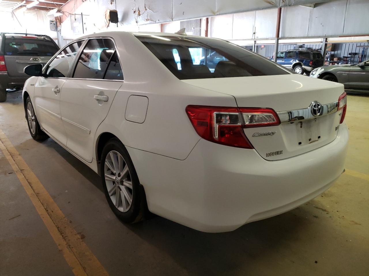 Photo 3 from auction – 2013 TOYOTA CAMRY HYBR with VIN 4T1BD1FK0DU080244