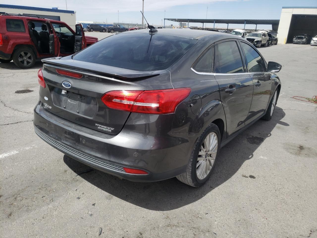 Photo 4 from auction – 2015 FORD FOCUS TITA with VIN 1FADP3J20FL358212