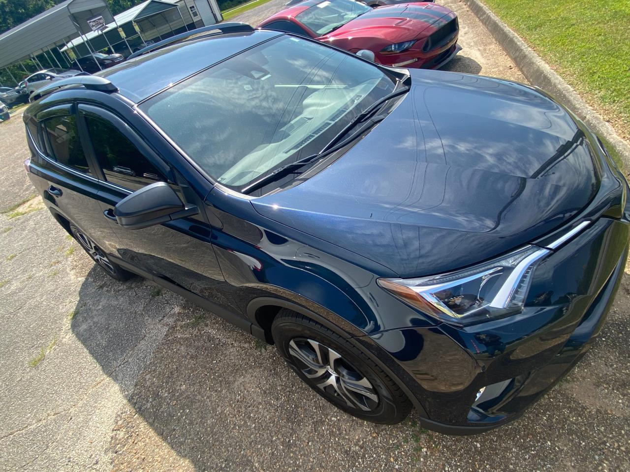 Photo 1 from auction – 2018 TOYOTA RAV4 LE with VIN JTMZFREV3JJ744945