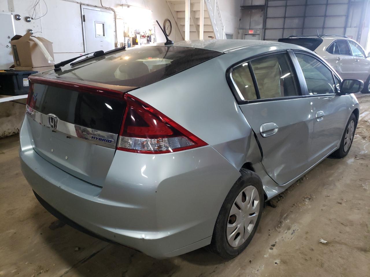 Photo 4 from auction – 2013 HONDA INSIGHT LX with VIN JHMZE2H52DS002779