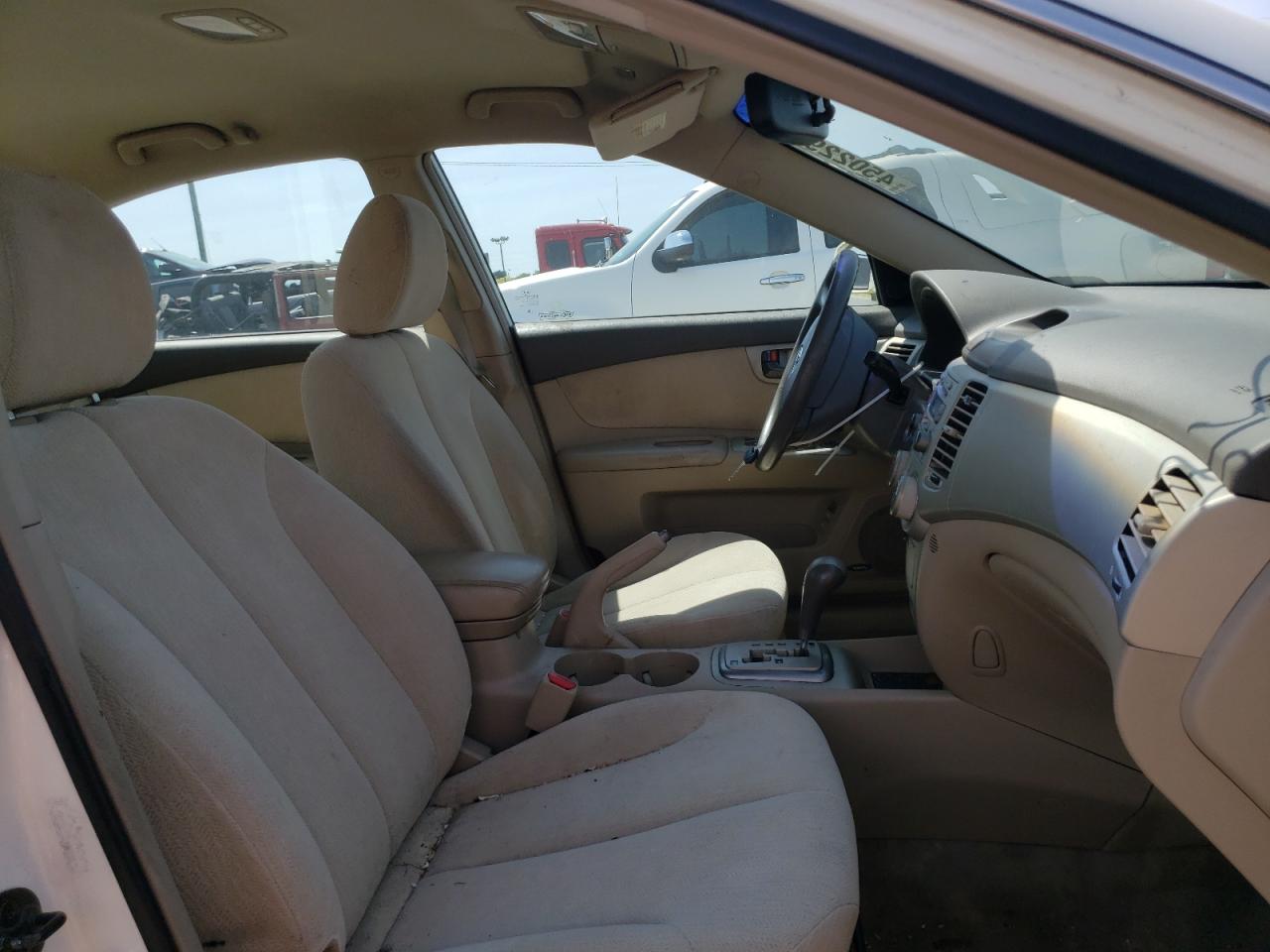 Photo 5 from auction – 2006 KIA OPTIMA LX with VIN KNAGE123665049676