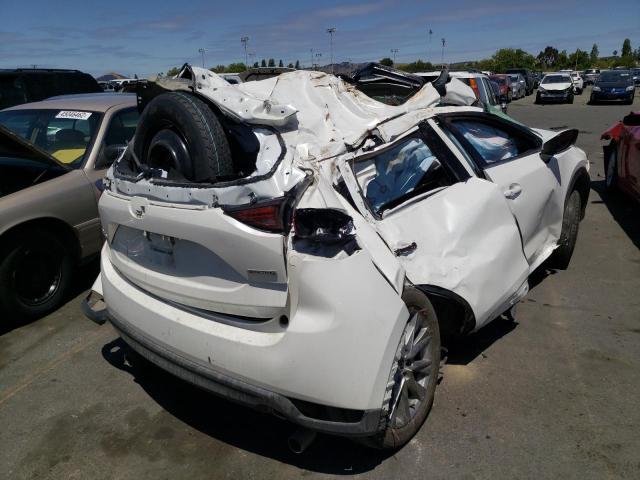 Photo 4 from auction – 2021 MAZDA CX-5 GRAND with VIN JM3KFADM2M0355047