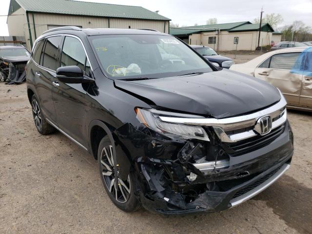 HONDA PILOT ELIT 2019 with VIN 5FNYF6H0XKB037182 - Photo from auction