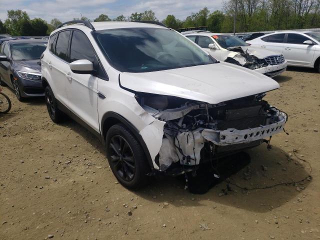 FORD ESCAPE SE 2018 with VIN 1FMCU9GD6JUC26211 - Photo from auction