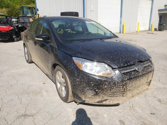 FORD FOCUS SE 2014 with VIN 1FADP3F24EL154648 - Photo from auction