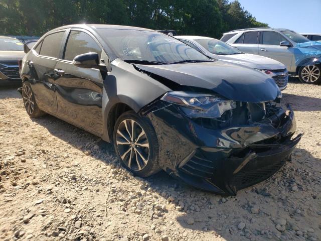 TOYOTA COROLLA L 2018 with VIN 5YFBURHE7JP811982 - Photo from auction