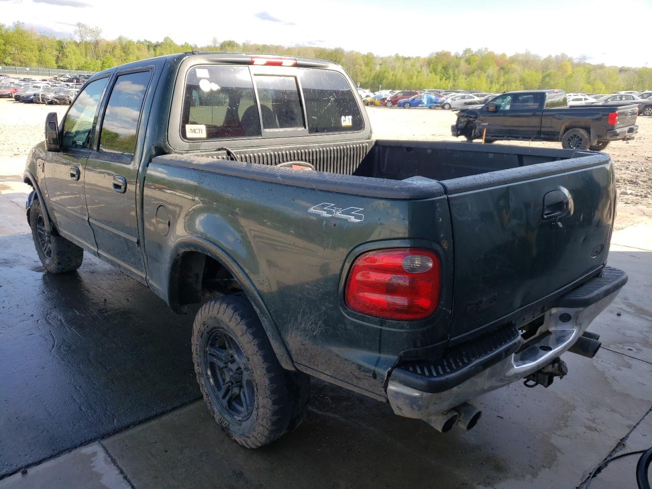 Photo 3 from auction – 2001 FORD F150 SUPER with VIN 1FTRW08LX1KE65752