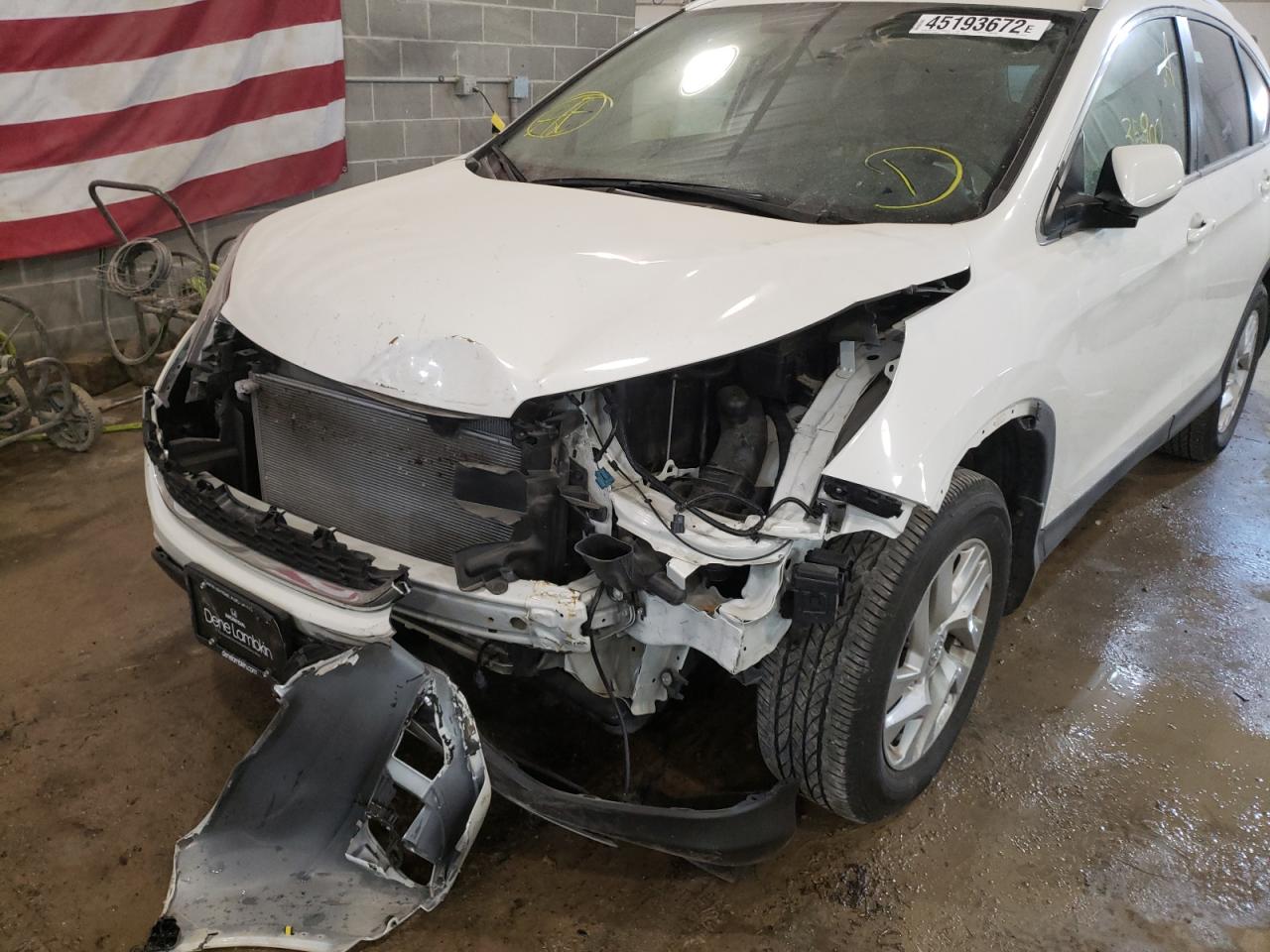 Photo 9 from auction – 2015 HONDA CR-V EXL with VIN 5J6RM4H77FL037973