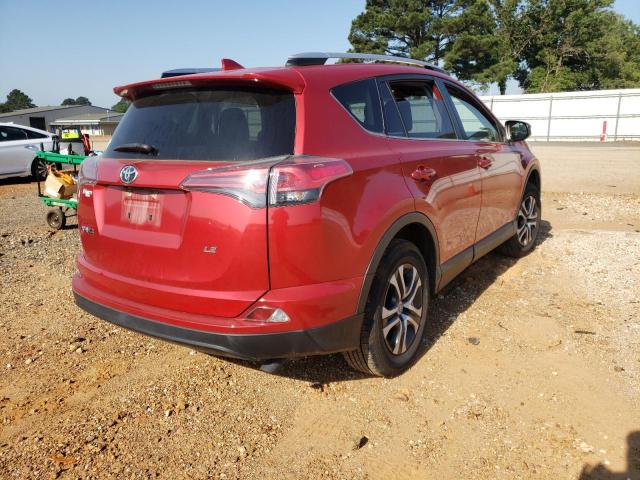 Photo 4 from auction – 2016 TOYOTA RAV4 LE with VIN JTMZFREV2GJ098404