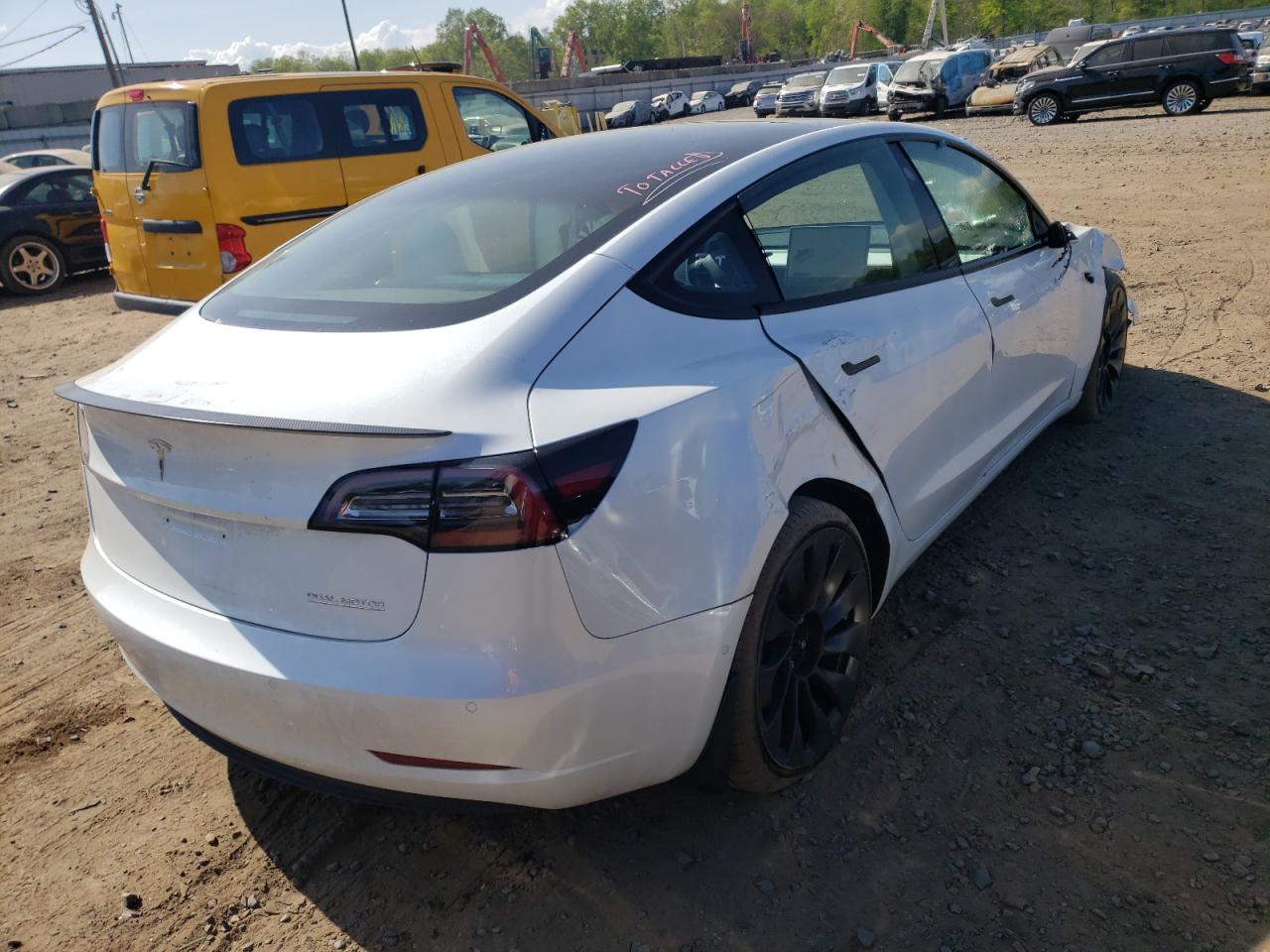 Photo 4 from auction – 2021 TESLA MODEL 3 with VIN 5YJ3E1EC8NF105708