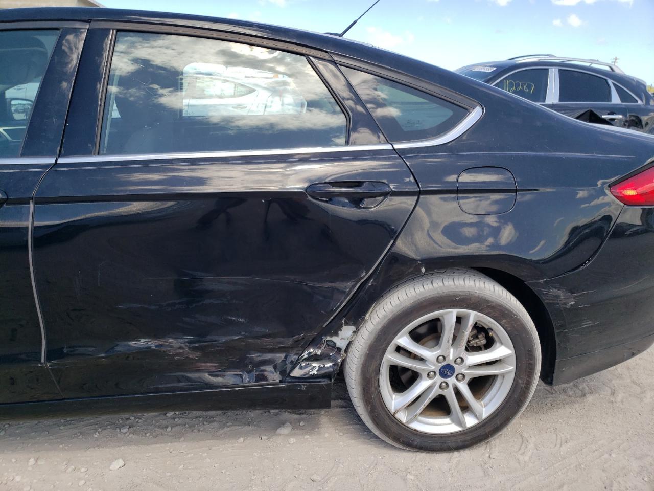 Photo 9 from auction – 2018 FORD FUSION SE with VIN 3FA6P0LU5JR160323