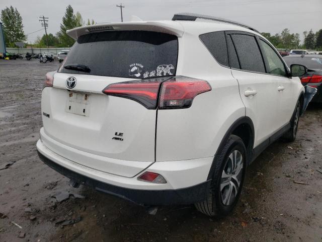 Photo 4 from auction – 2018 TOYOTA RAV4 LE with VIN JTMBFREV3JJ728052
